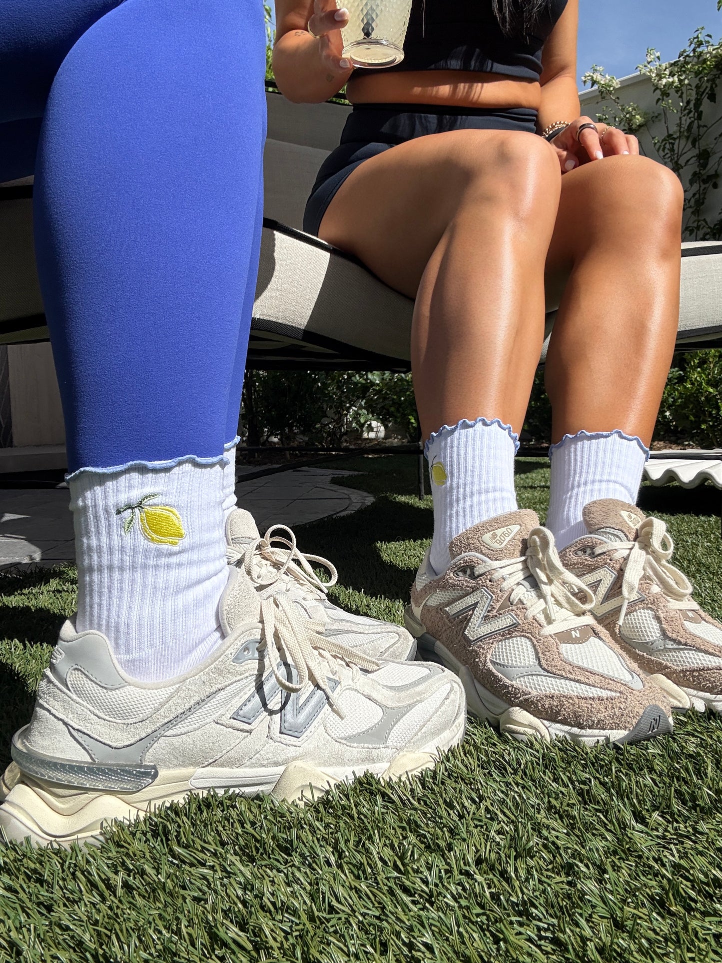 Close up photo of Girls wearing Santorini grip socks with shoes