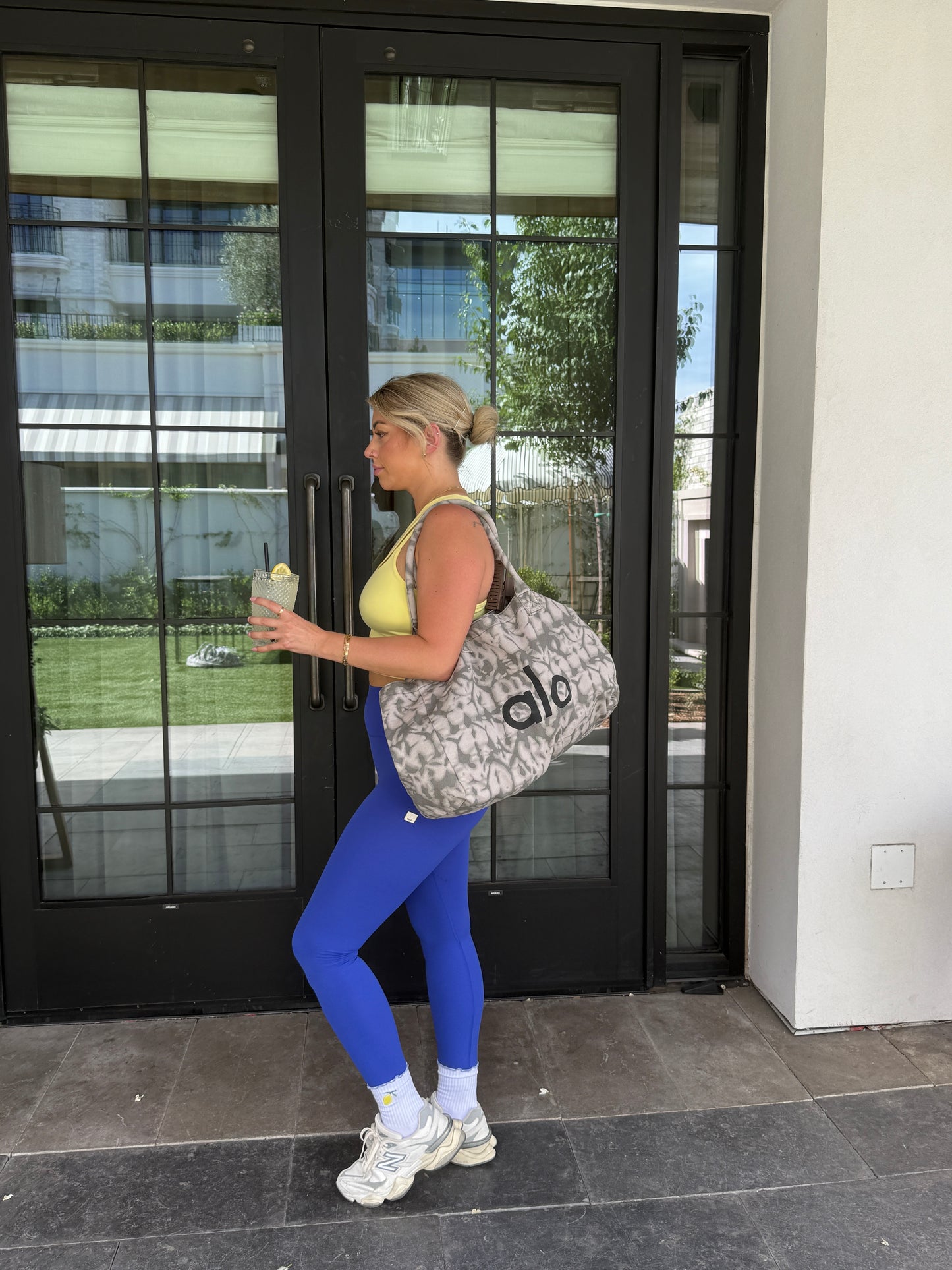 Photo of girl wearing Santorini non slip grips socks while walking